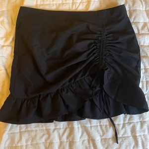 SHEIN Black Mini skirt in a size Large with pull strings.